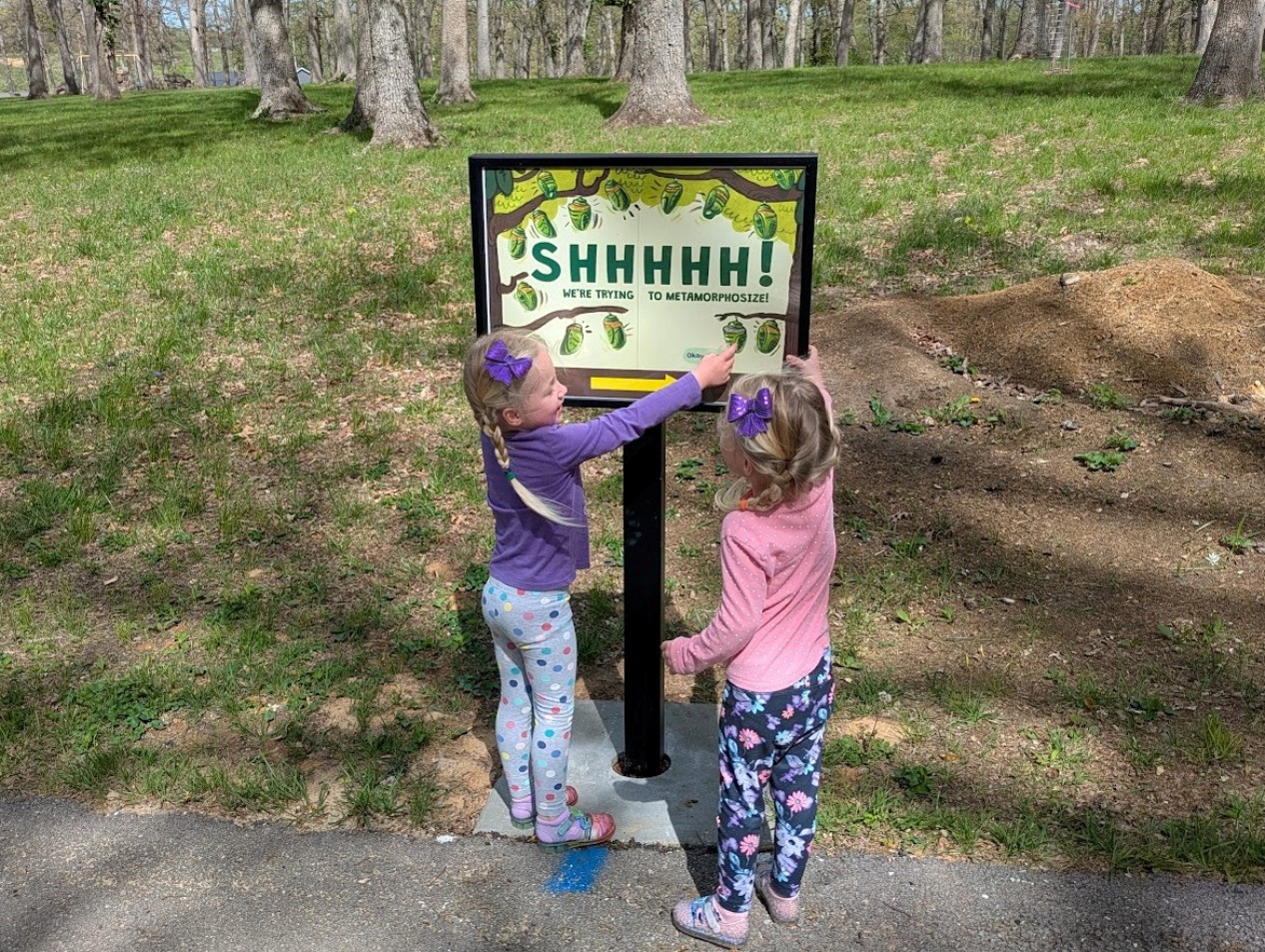 Kids reading Warrenton Storywalk